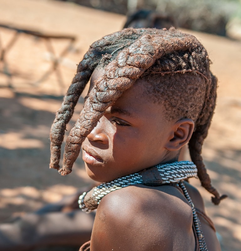 Himba little boy with braids