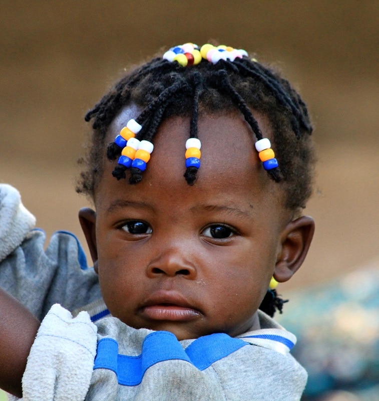 little boy braids with beads