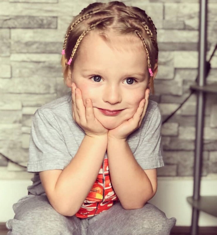 little boy's blonde braids