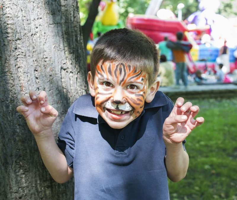 kids face painting with different patterns