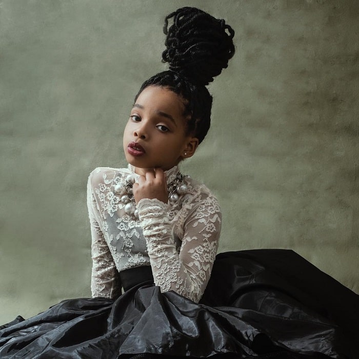 little black girl with braided bun