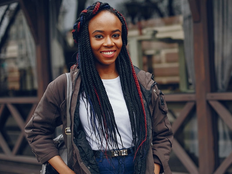 black girl with colorful box braids