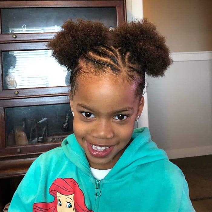 Image of Messy bun hairstyle for short hair black girl 10 years old