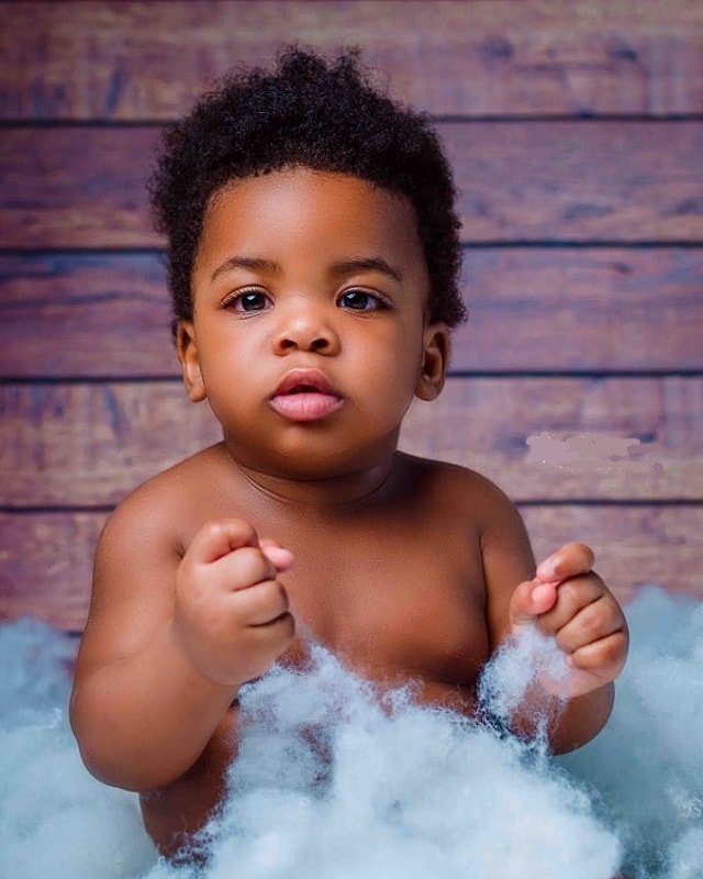 baby boy curly hair with tapered sides