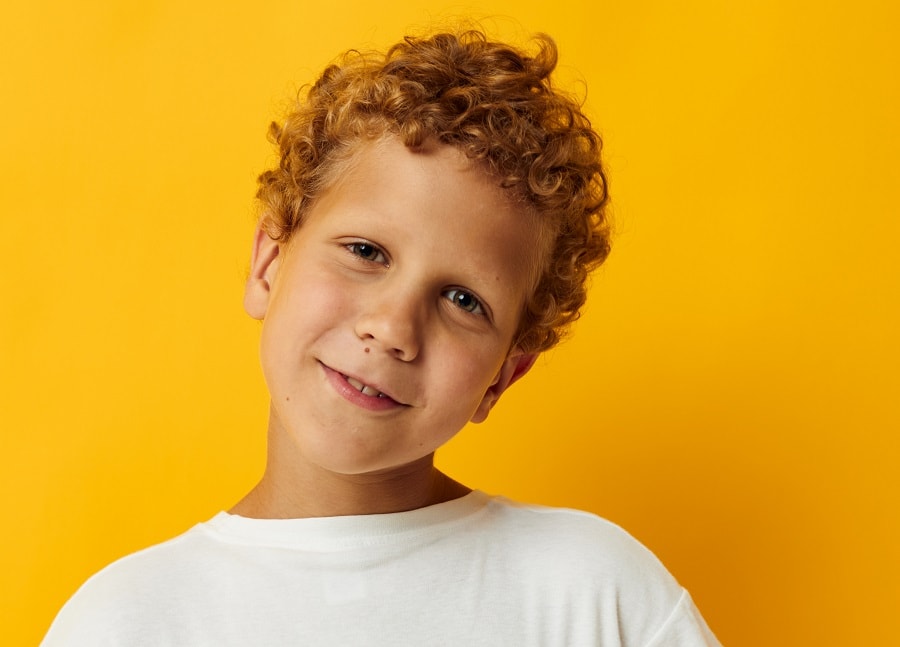 little boy with short curly hair