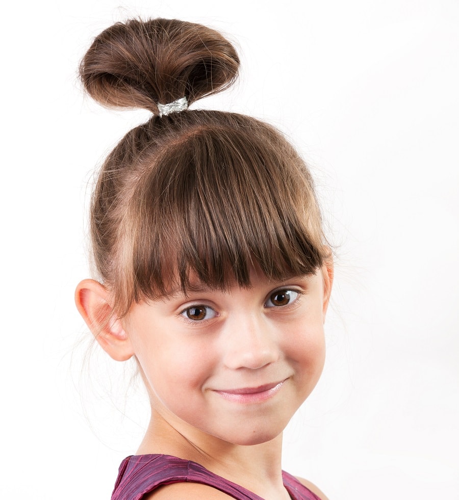 little girl with blunt bangs