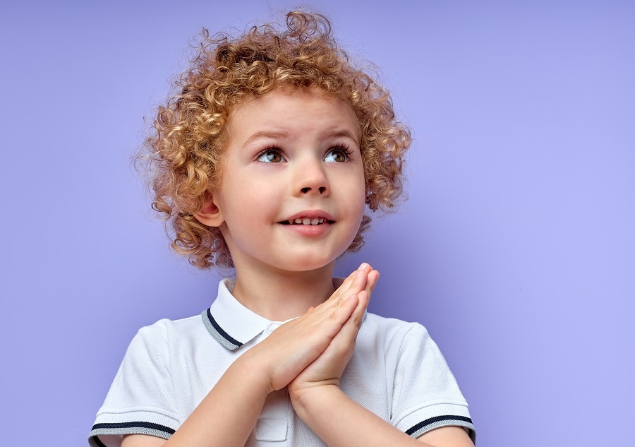 messy curly hairstyle for little boys