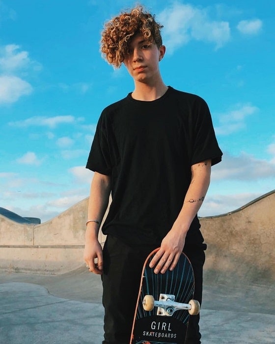 skater boy haircut with curls