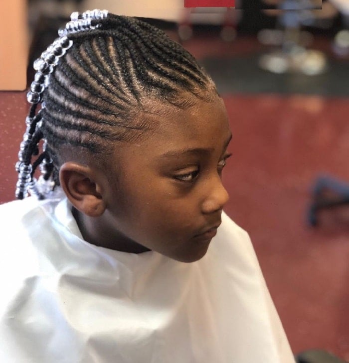 Kid’s mohawk braids with beads