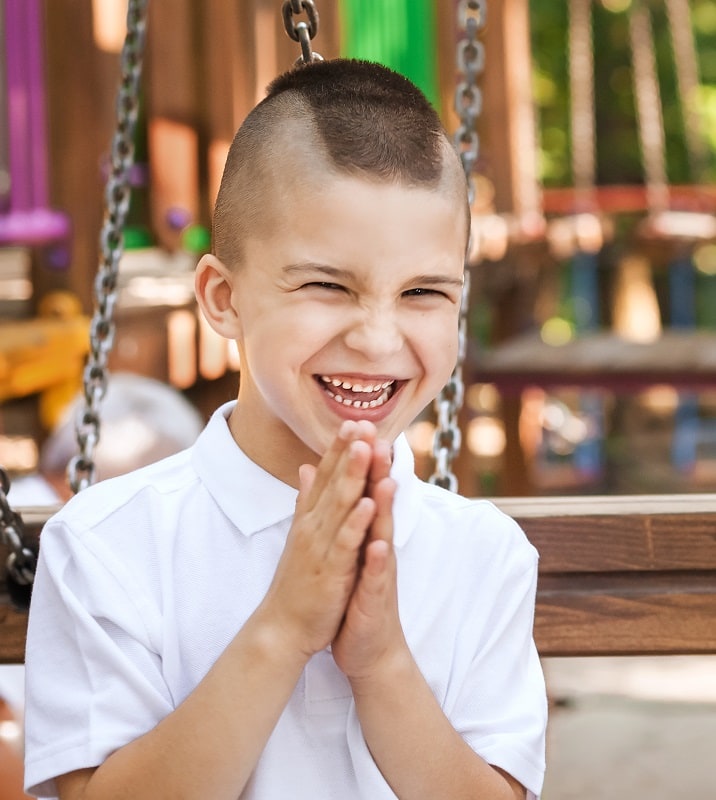 little boy with mohawk