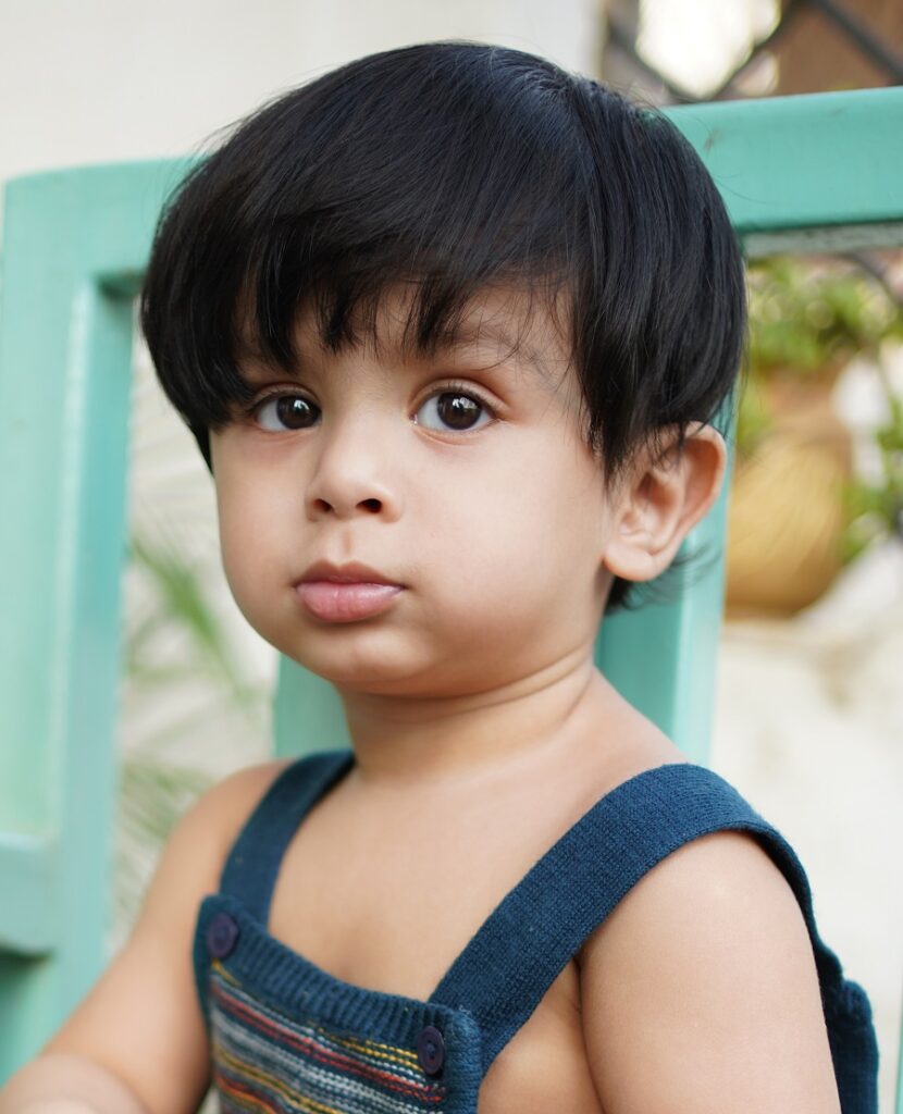 Indian baby boy with bowl cut