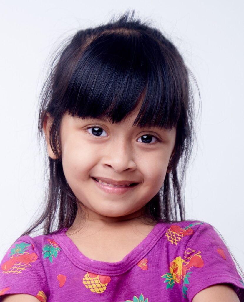 Indian baby girl with half up hairstyle