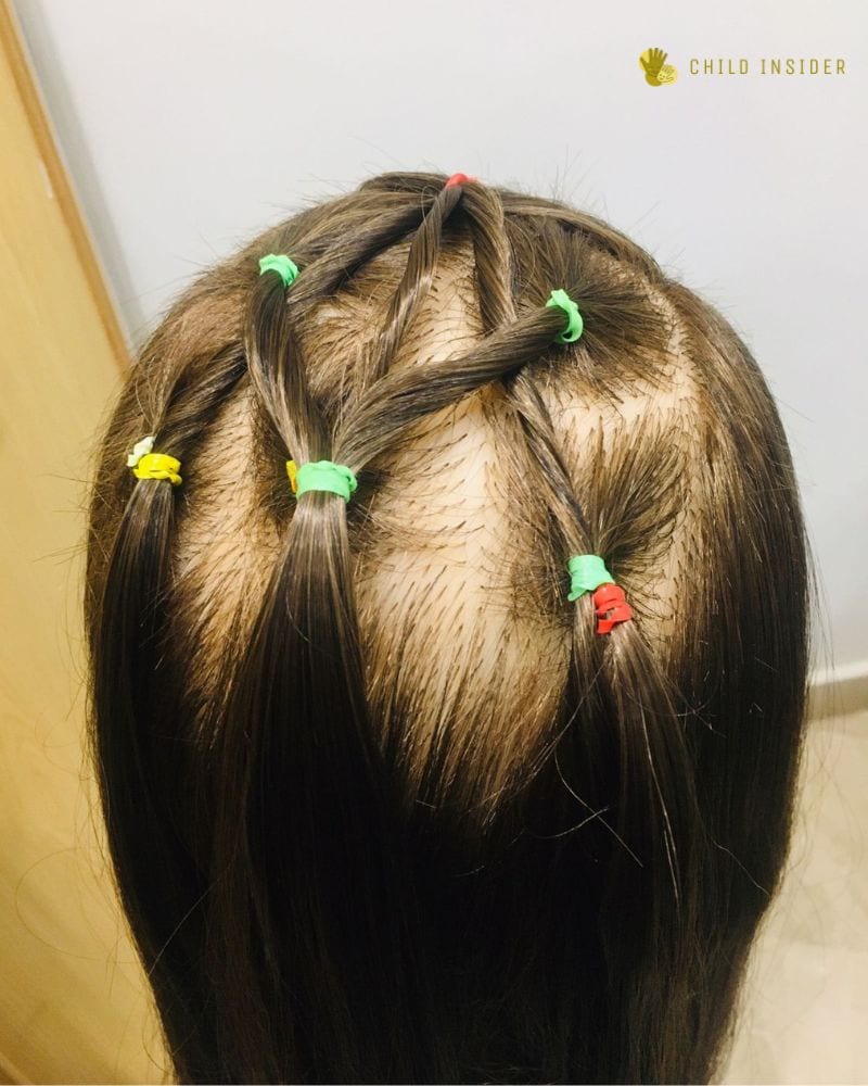 Twisted hairstyle using colorful rubber bands